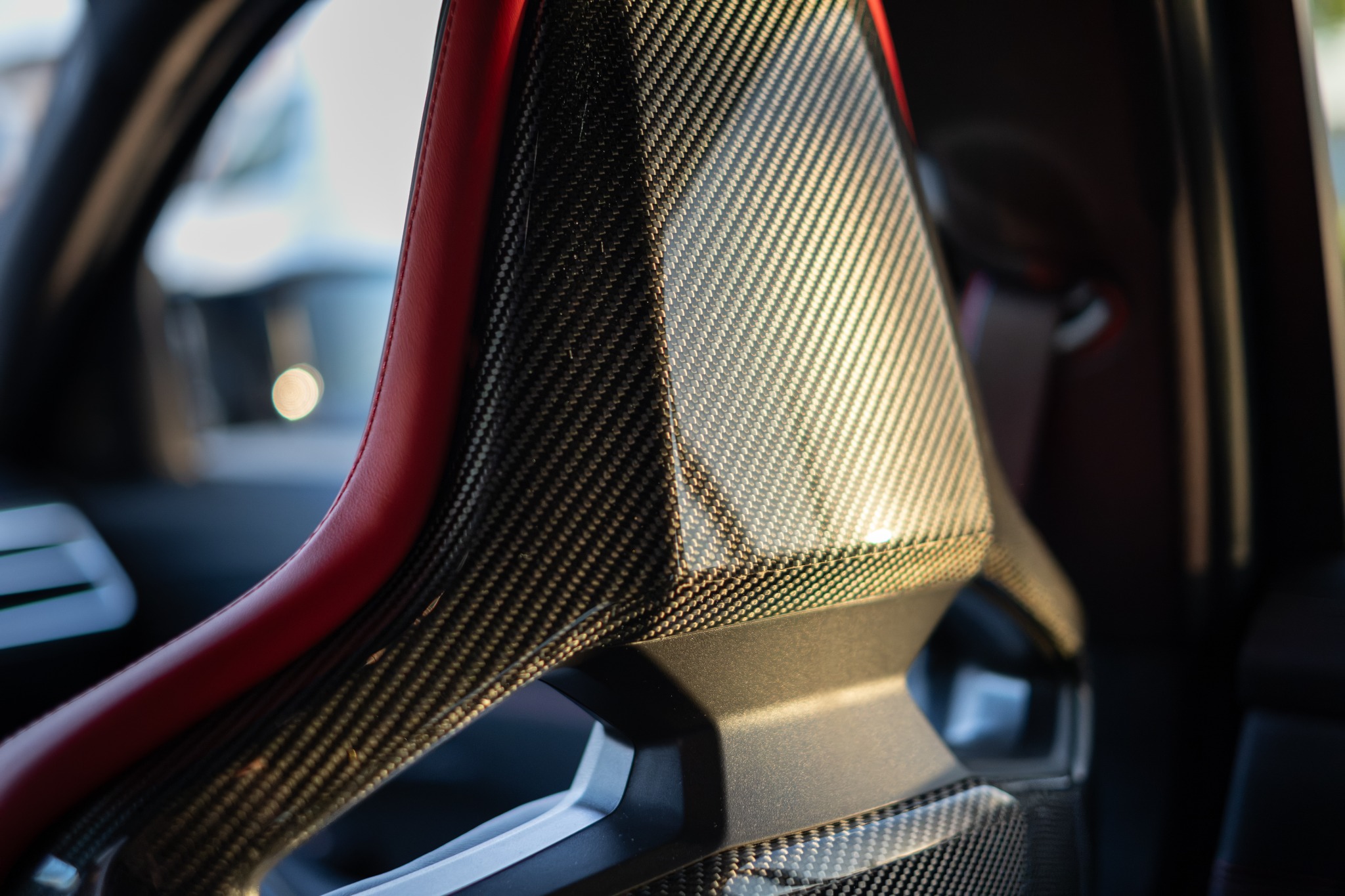 BMW M3 CS Touring carbon detail van de stoel